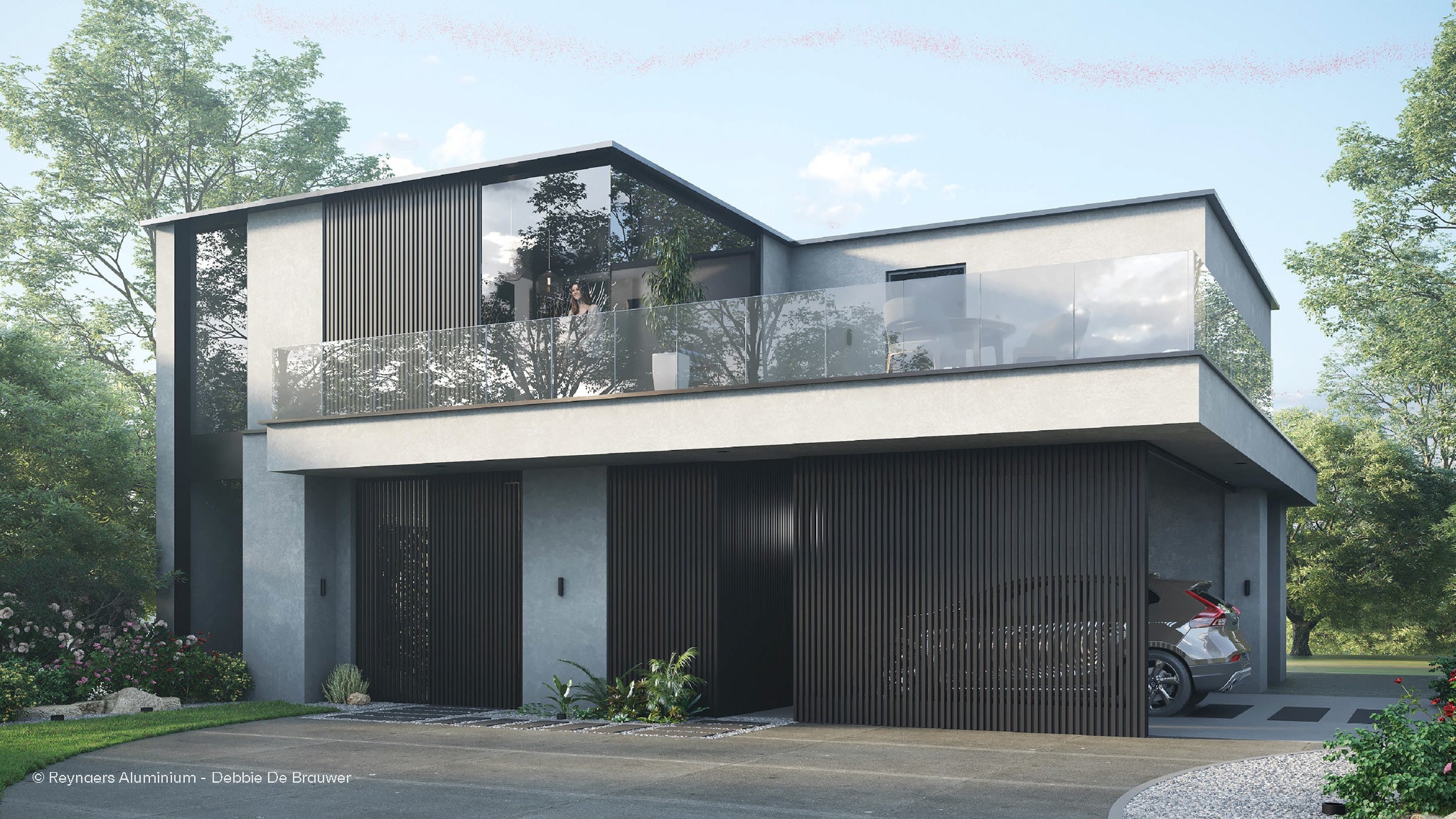 Modern house with a driveway and trees in the background